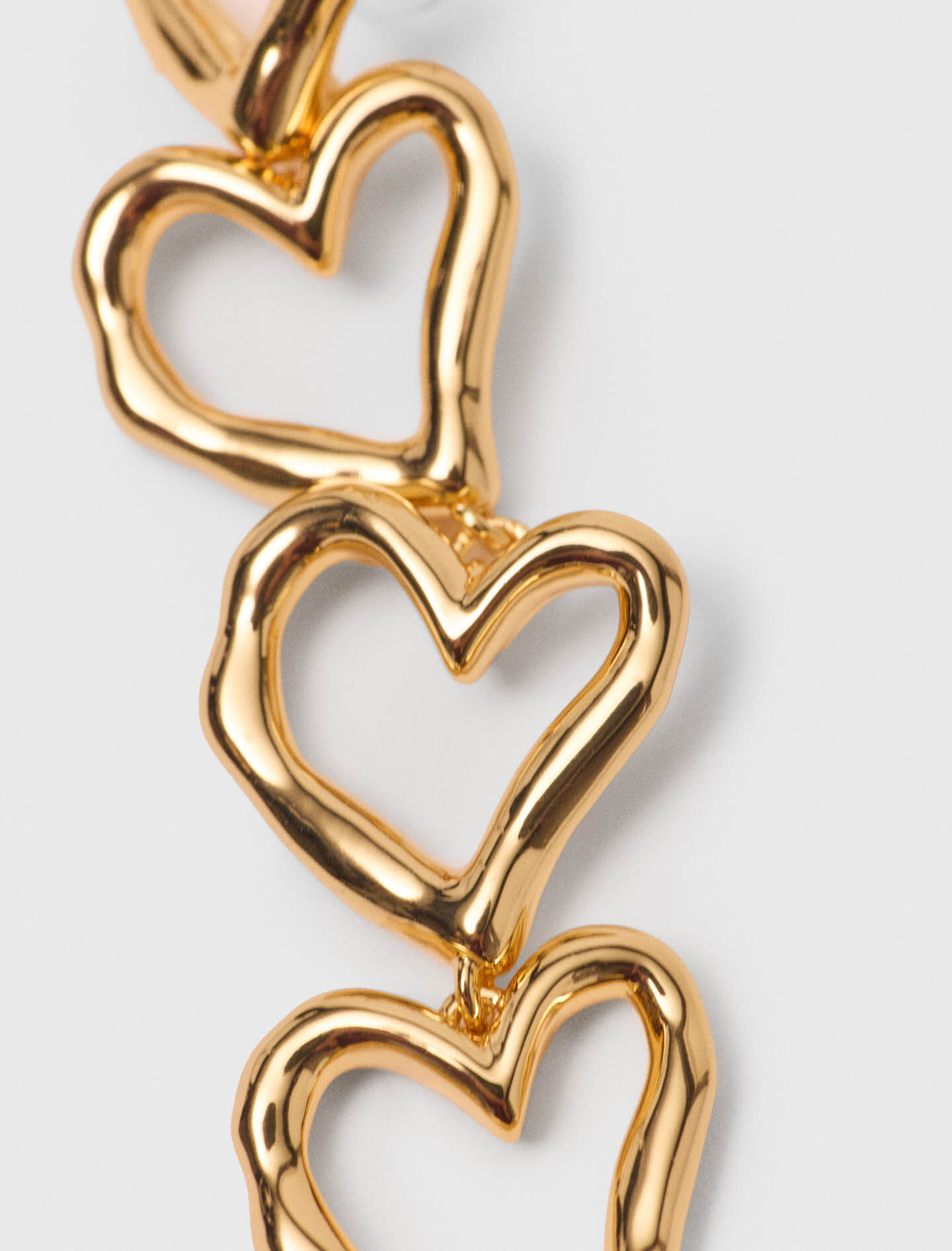 Auriculares de corazón asimétricos