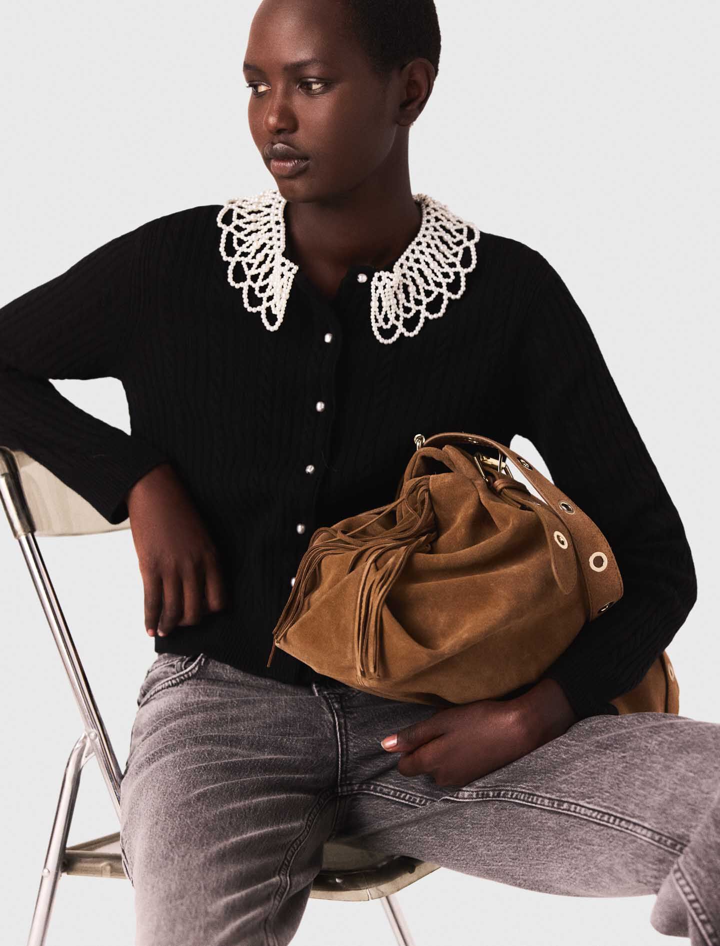 Cardigan con collar de cuentas desmontable