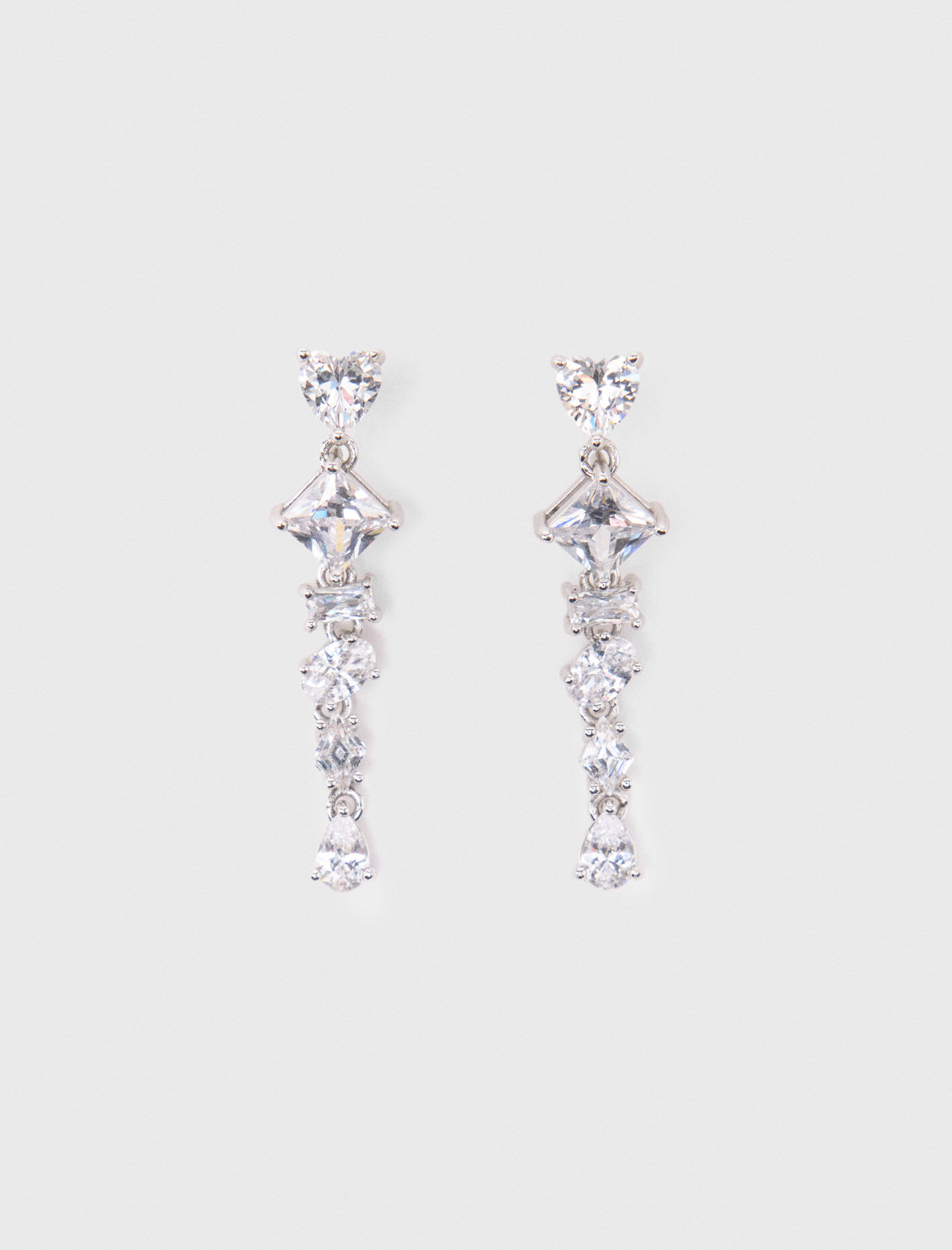 Auriculares con corazón de cristal